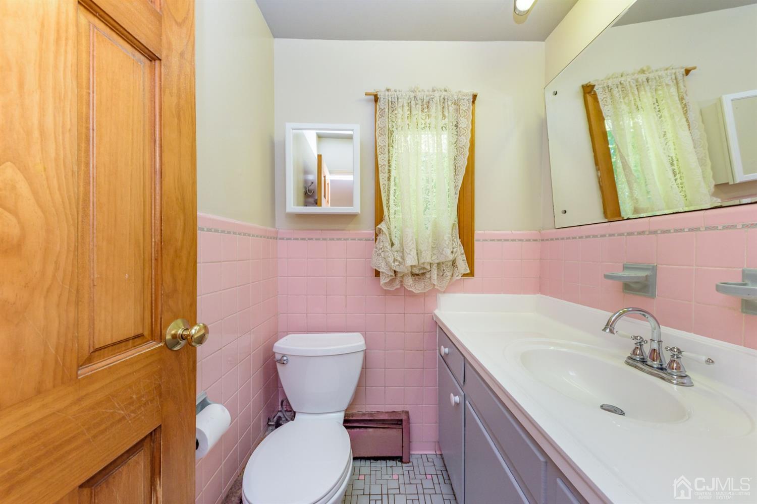 363 Rockport Road Port Murray, NJ 07865 - Photo 16 of 23 a bathroom with a sink toilet and shower