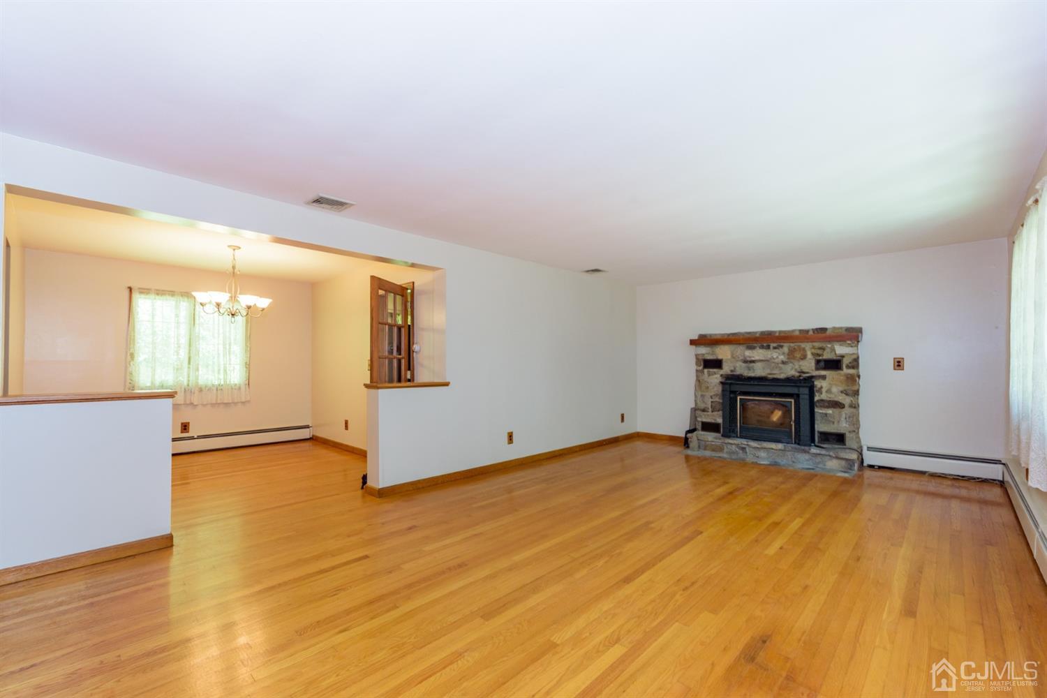 363 Rockport Road Port Murray, NJ 07865 - Photo 3 of 23 a view of a livingroom with furniture and kitchen view