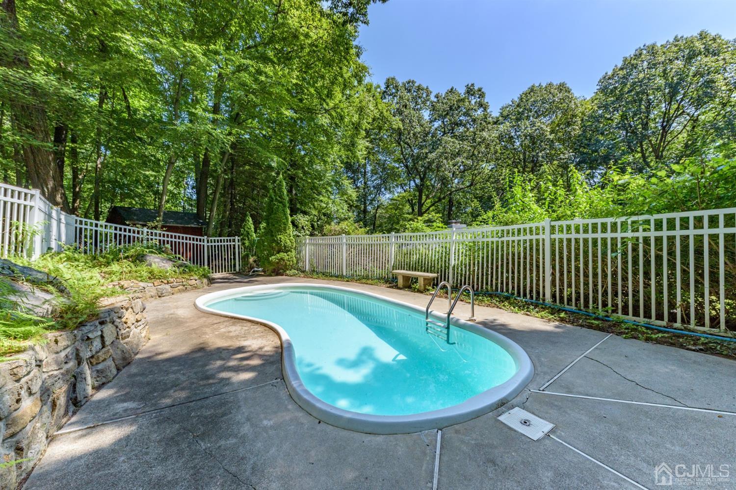 363 Rockport Road Port Murray, NJ 07865 - Photo 22 of 23 a view of a swimming pool with a patio and yard