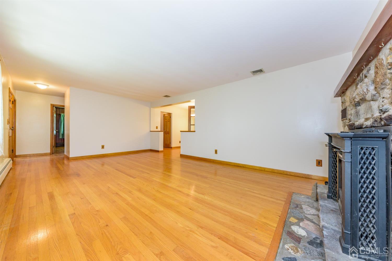 363 Rockport Road Port Murray, NJ 07865 - Photo 4 of 23 a view of empty room with wooden floor