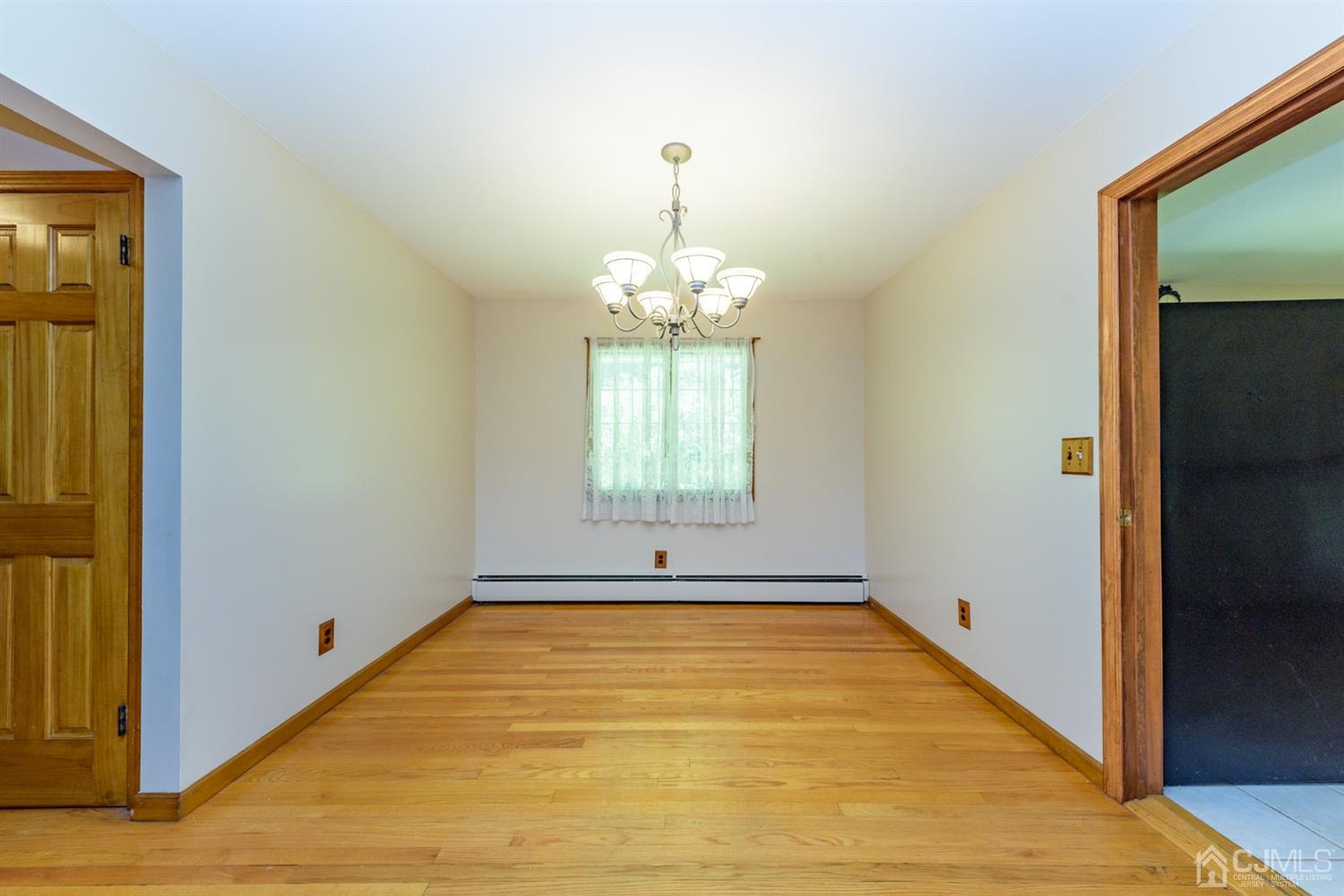 363 Rockport Road Port Murray, NJ 07865 - Photo 6 of 23 a view of an empty room with window