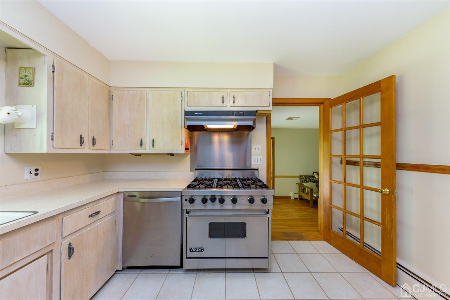 363 Rockport Road Port Murray, NJ 07865 - Photo 9 of 23 a kitchen with a stove top oven and cabinets