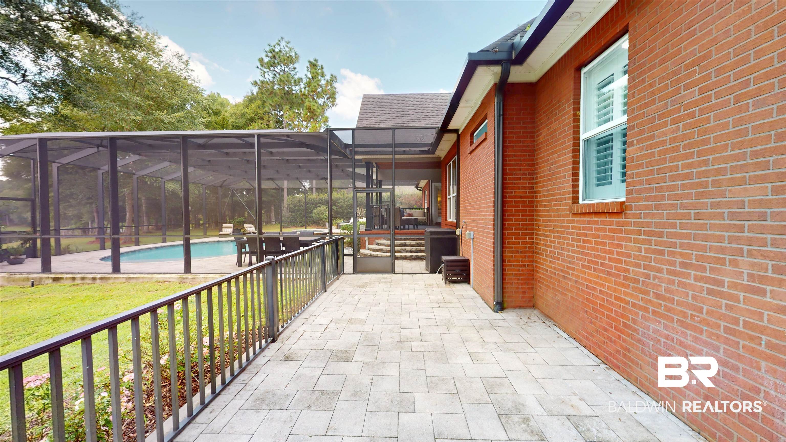 8775 Dawes Lake Road North Mobile, AL 36619 - Photo 46 of 59 View of patio / terrace with an outdoor pool and a lanai