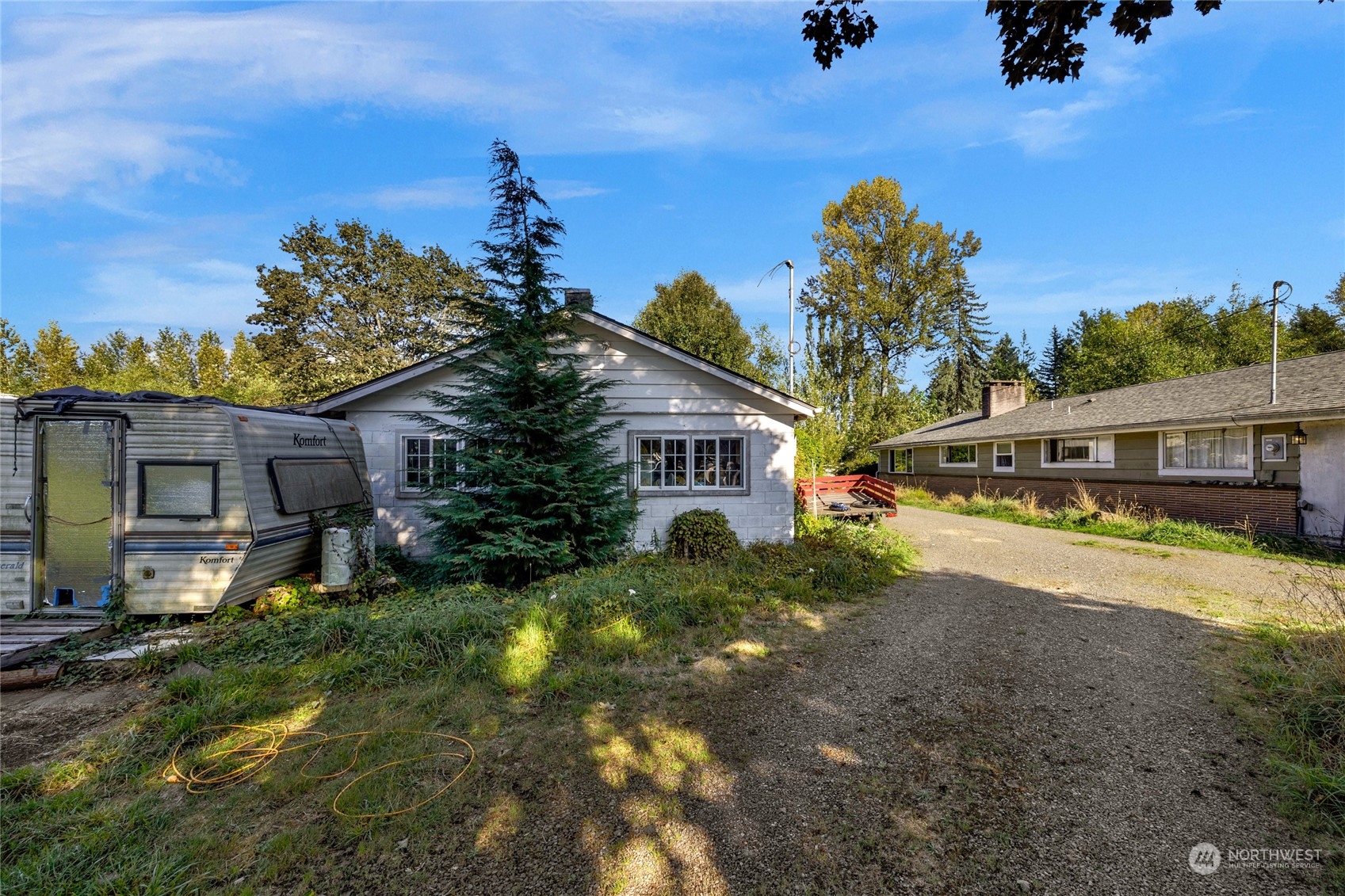 511 Creekside Road Sultan, WA 98294 - Photo 3 of 7 a house view with a garden space