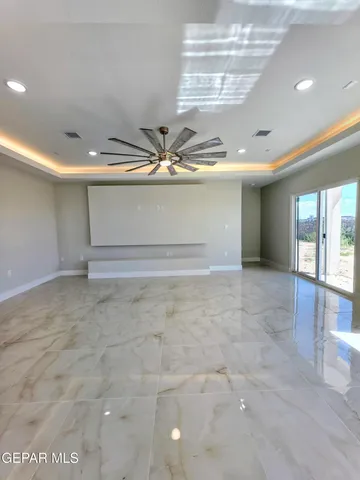 a large bathroom with a double vanity sink and a mirror