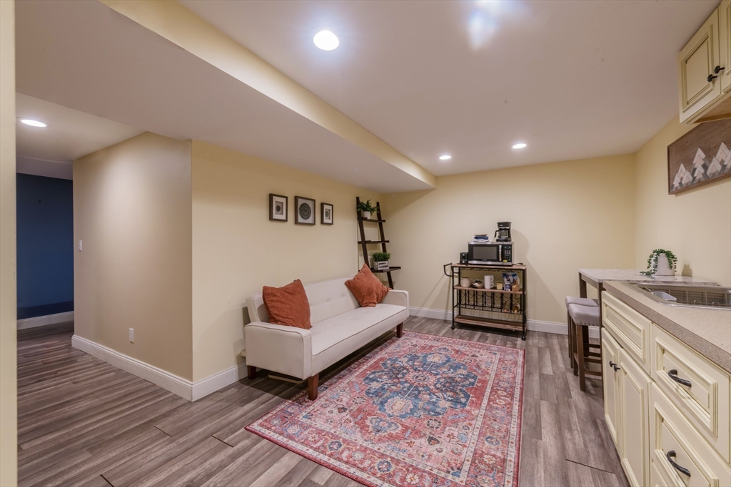 155 Great Marsh Road Centerville, MA 02632 - Photo 29 of 36 a spacious bedroom with a bed and furniture