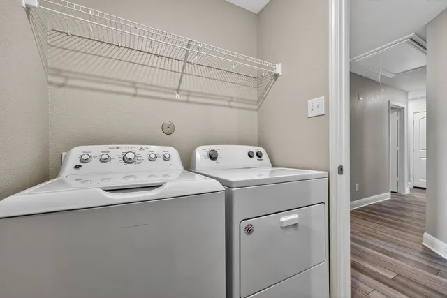 a utility room with dryer and washer