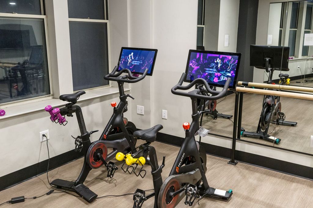 67 Wall Street, Unit 18H Manhattan, NY 10005 - Photo 13 of 20 a view of a room with gym equipment