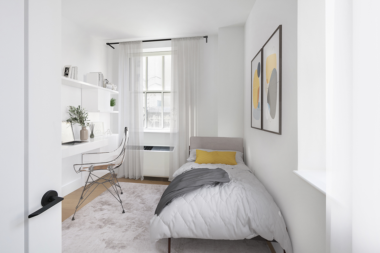 67 Wall Street, Unit 18H Manhattan, NY 10005 - Photo 4 of 20 a living room with furniture and a window