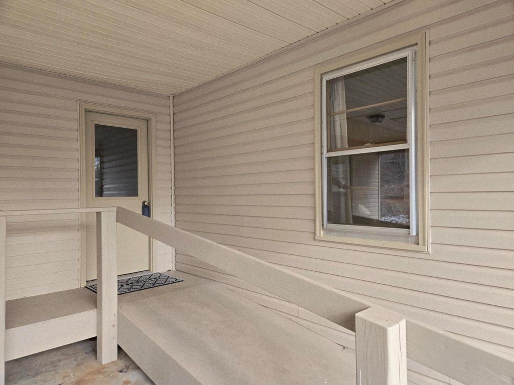 6656 Fires Creek Road Hayesville, NC 28904 - Photo 26 of 38 a view of an front door and bedroom