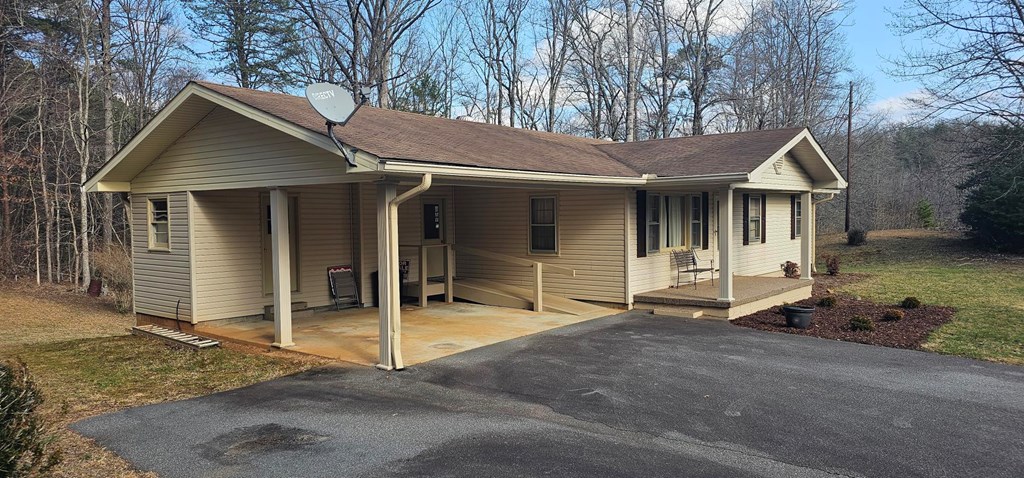 6656 Fires Creek Road Hayesville, NC 28904 - Photo 4 of 38 a house with white door of the house