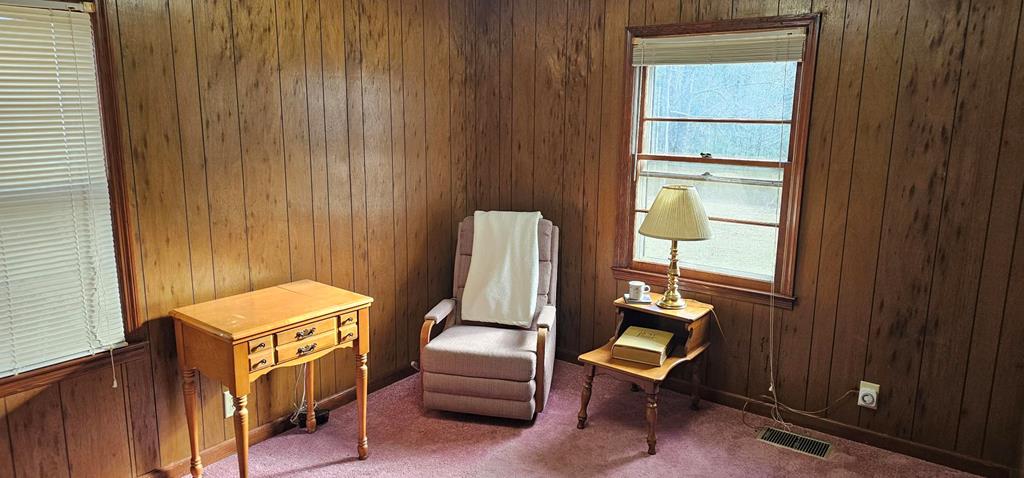 6656 Fires Creek Road Hayesville, NC 28904 - Photo 8 of 38 a view of sitting area with furniture and a window