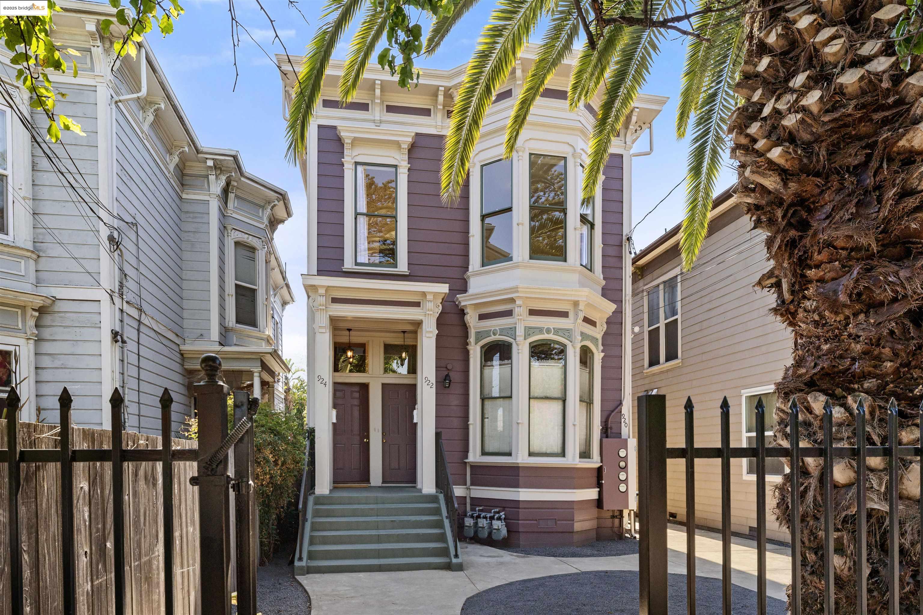 924 Center Street Oakland, CA 94607 - Photo 1 of 1 a view of a brick building next to a yard