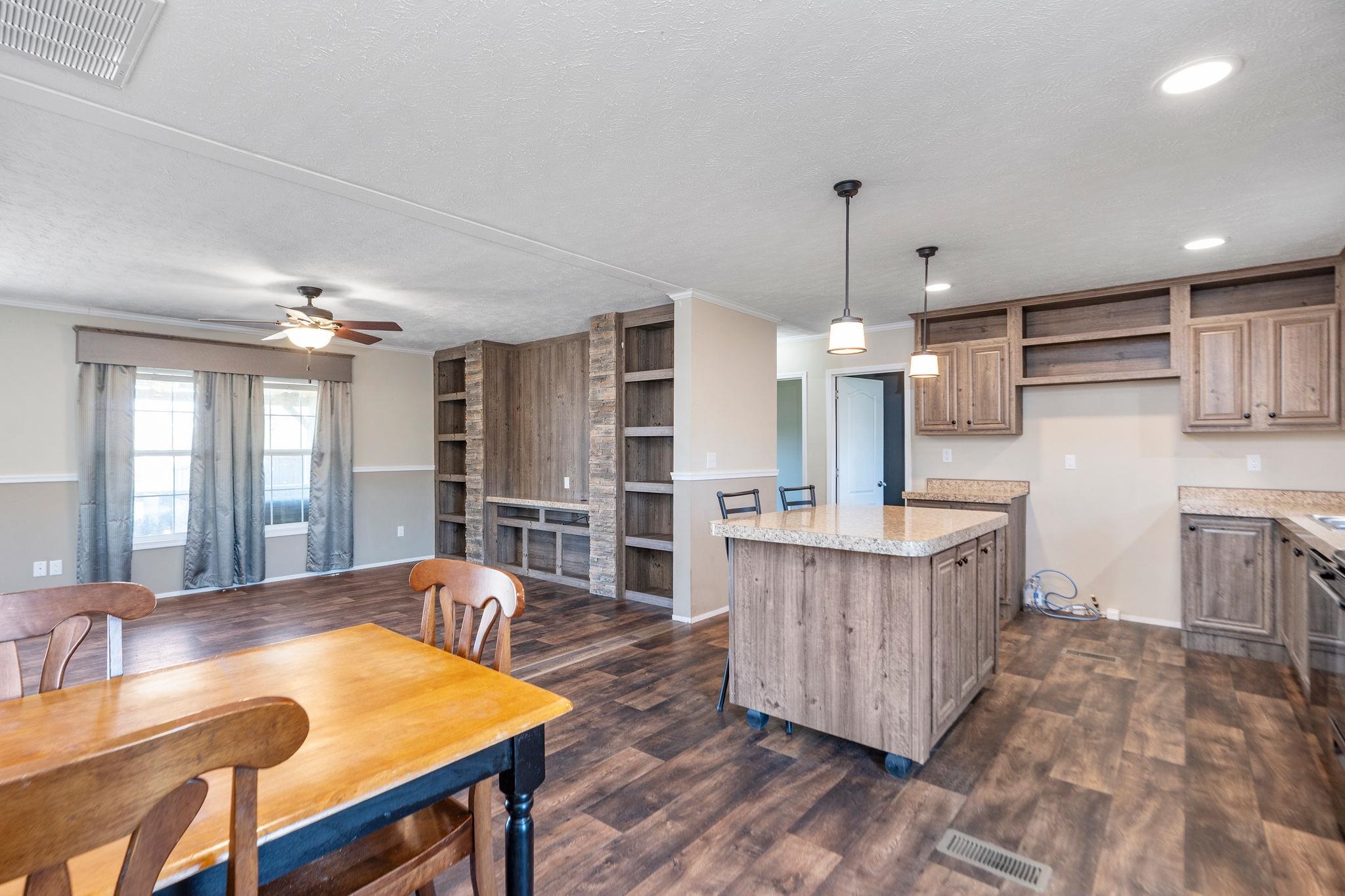 2061 Cecil Wampler Road Mount Crawford, VA 22841 - Photo 33 of 70 a large kitchen with kitchen island a large island in the center