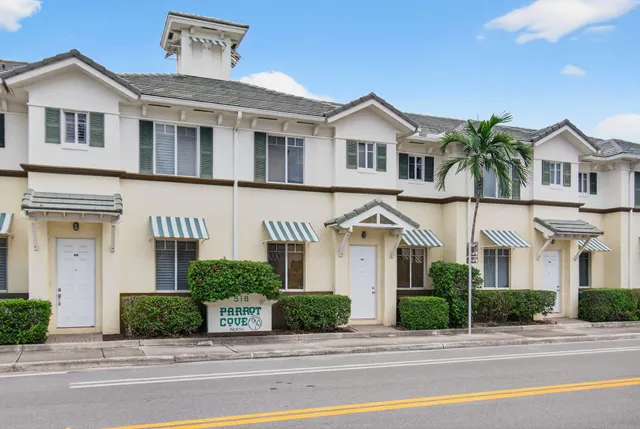 a view of an empty room with a fan