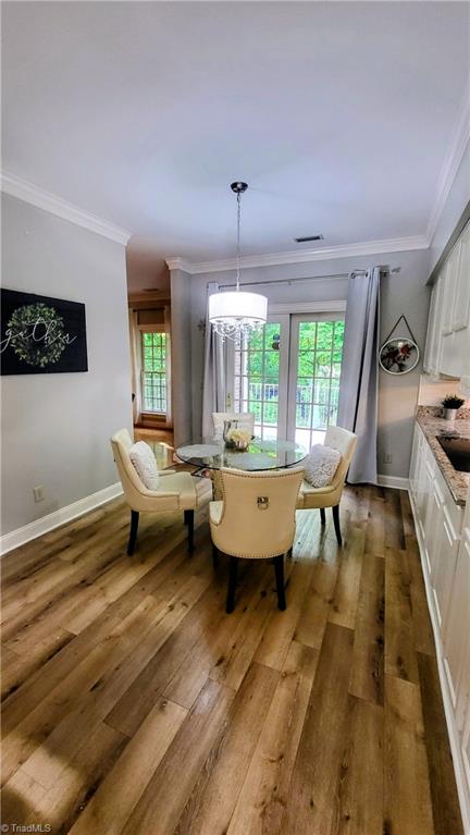 7035 Skylark Road Pfafftown, NC 27040 - Photo 6 of 47 Light-Filled Breakfast Area Opening to Patio & Gazebo for Easy Entertaining!