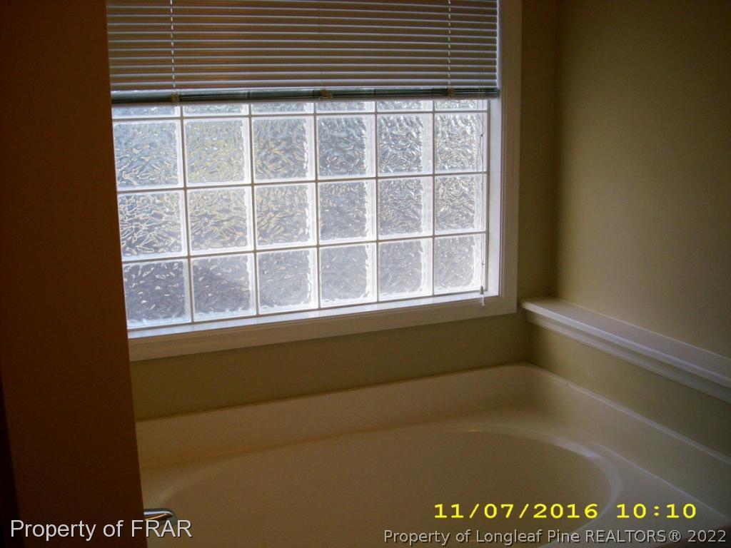 1820-2 Sardonyx Road Fayetteville, NC 28303 - Photo 12 of 21 a view of empty room with windows