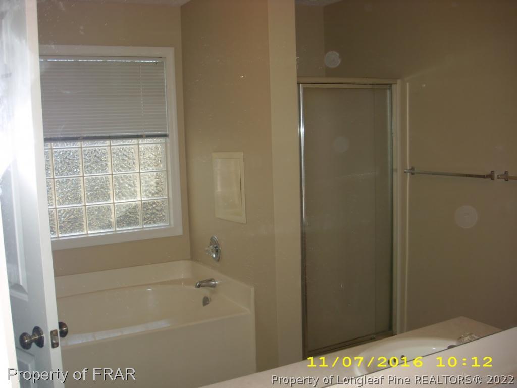 1820-2 Sardonyx Road Fayetteville, NC 28303 - Photo 14 of 21 a bathroom with a bathtub