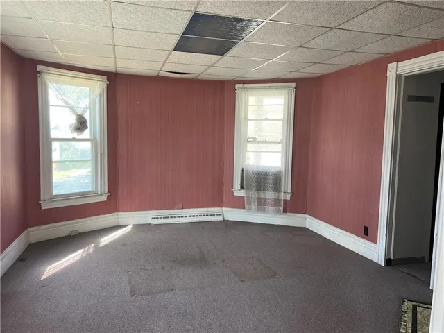 an empty room with windows