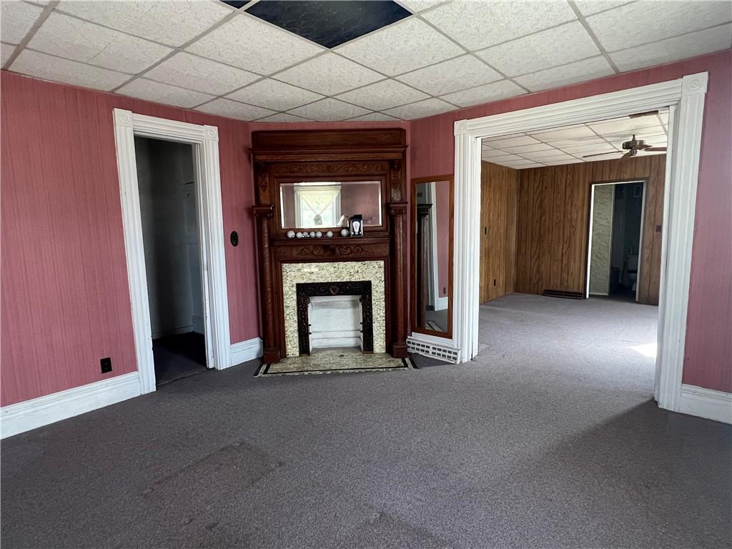 120 Jefferson Avenue Sharon, PA 16146 - Photo 12 of 33 a view of an empty room with a fireplace