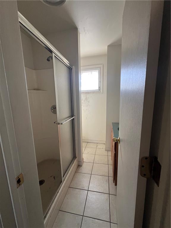 120 Jefferson Avenue Sharon, PA 16146 - Photo 19 of 33 a bathroom with a glass door shower and a sink