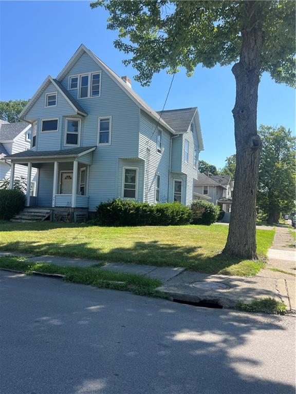 120 Jefferson Avenue Sharon, PA 16146 - Photo 3 of 33 a view of a house with a big yard plants and a large tree