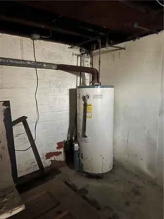 a picture of a bathroom with a shower