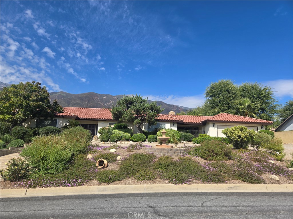 9388 Valley View Street Rancho Cucamonga, CA 91737 - Photo 2 of 40 a backyard of a house with yard and outdoor seating