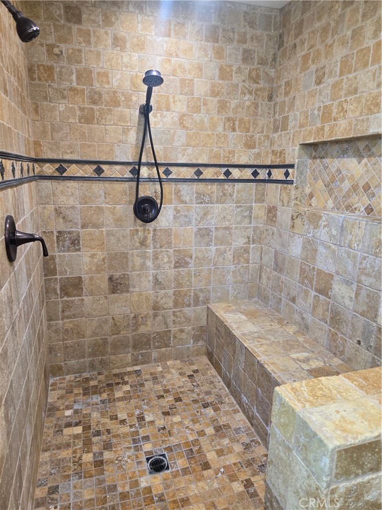 9388 Valley View Street Rancho Cucamonga, CA 91737 - Photo 25 of 40 a bathroom with a shower