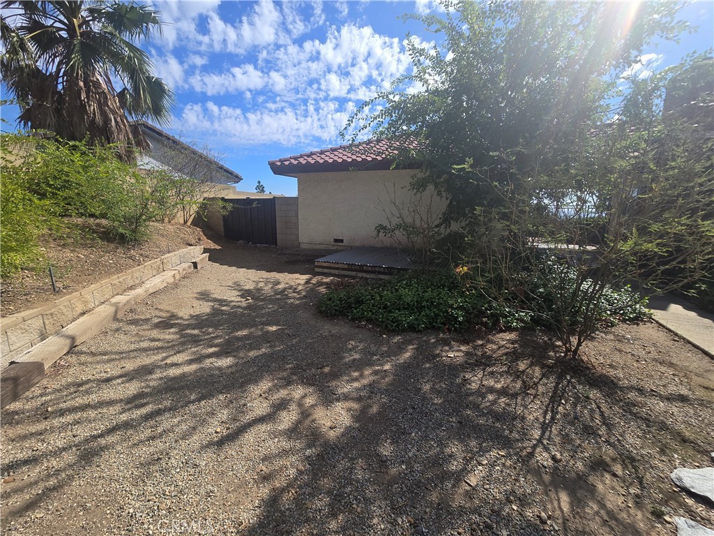 9388 Valley View Street Rancho Cucamonga, CA 91737 - Photo 36 of 40 a backyard of a house with lots of green space