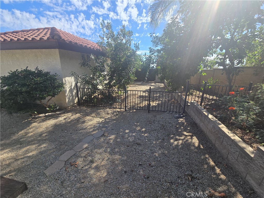 9388 Valley View Street Rancho Cucamonga, CA 91737 - Photo 40 of 40 a view of a chairs and table in the backyard