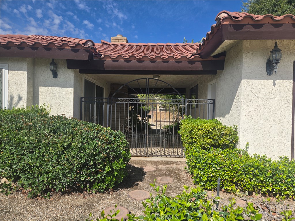 9388 Valley View Street Rancho Cucamonga, CA 91737 - Photo 4 of 40 a view of a patio with a table and chairs