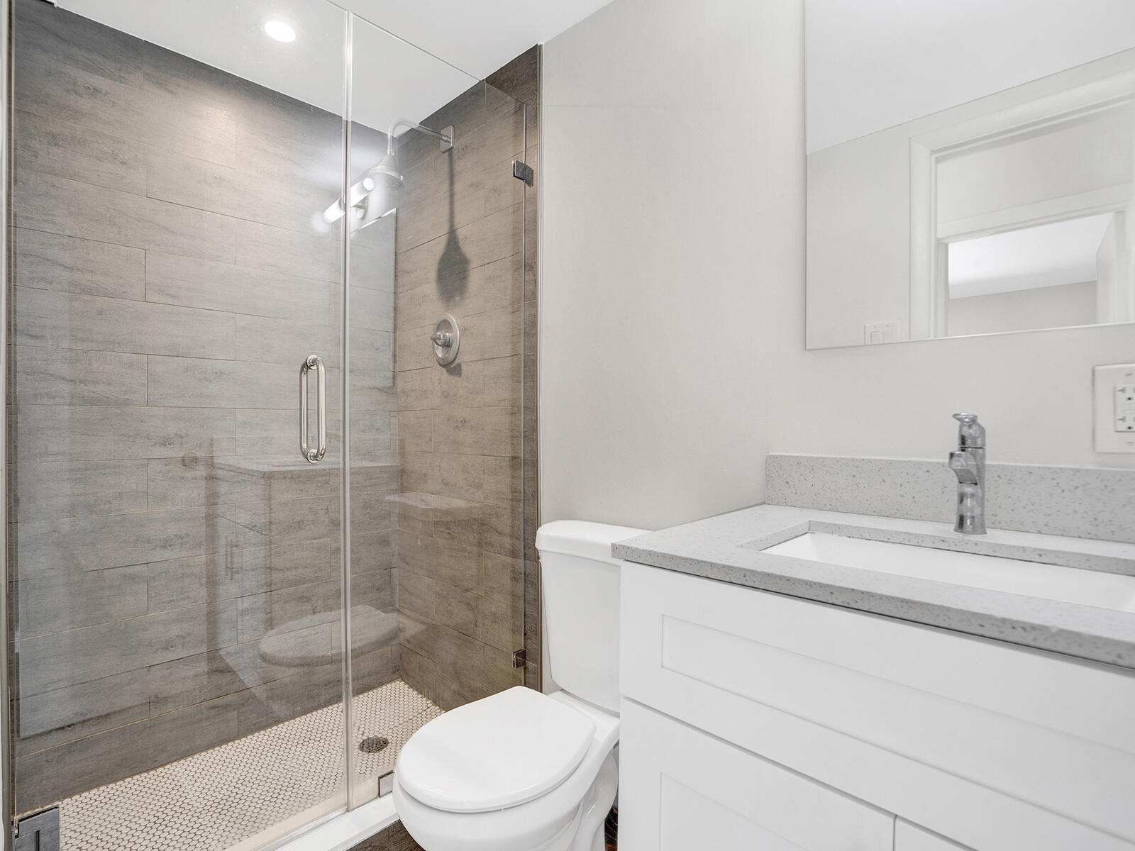 1129 Pebble Beach Lane, Unit 11 Marathon, FL 33050 - Photo 12 of 36 a bathroom with a sink a toilet and shower
