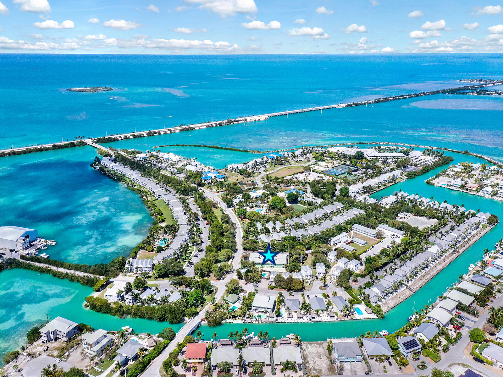 1129 Pebble Beach Lane, Unit 11 Marathon, FL 33050 - Photo 31 of 36 a view of an ocean and a building
