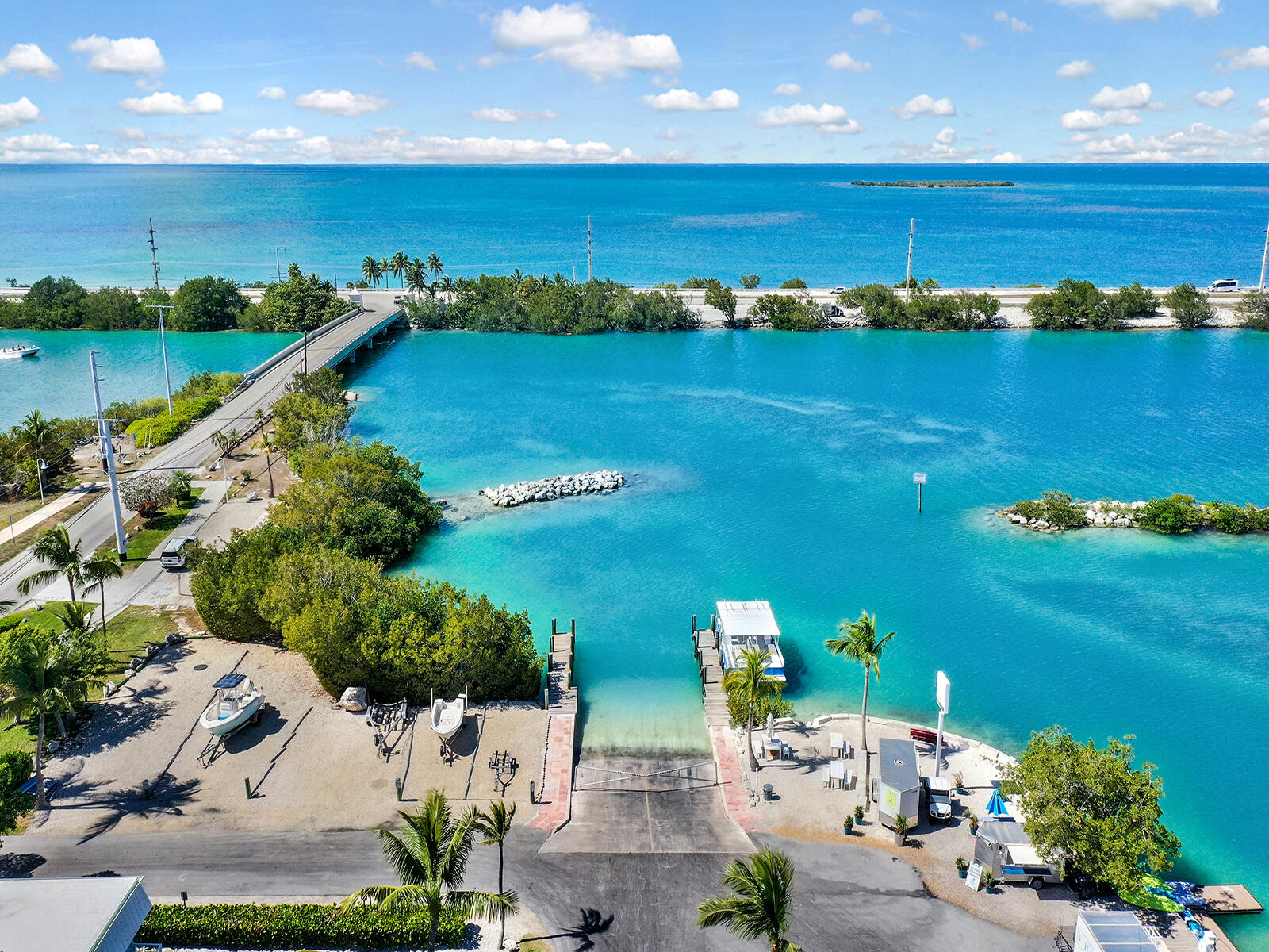 1129 Pebble Beach Lane, Unit 11 Marathon, FL 33050 - Photo 35 of 36 a view of a lake and a yard