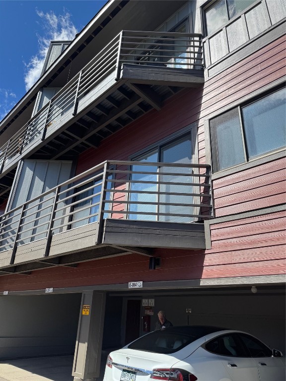 98000 Ryan Gulch Road, Unit E104 Silverthorne, CO 80498 - Photo 23 of 34 a front view of a house