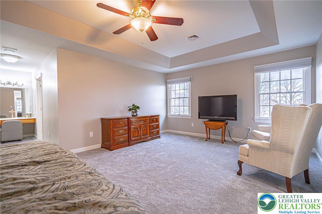 6551 Overlook Road Orefield, PA 18069 - Photo 40 of 82 a bedroom with furniture and a flat screen tv
