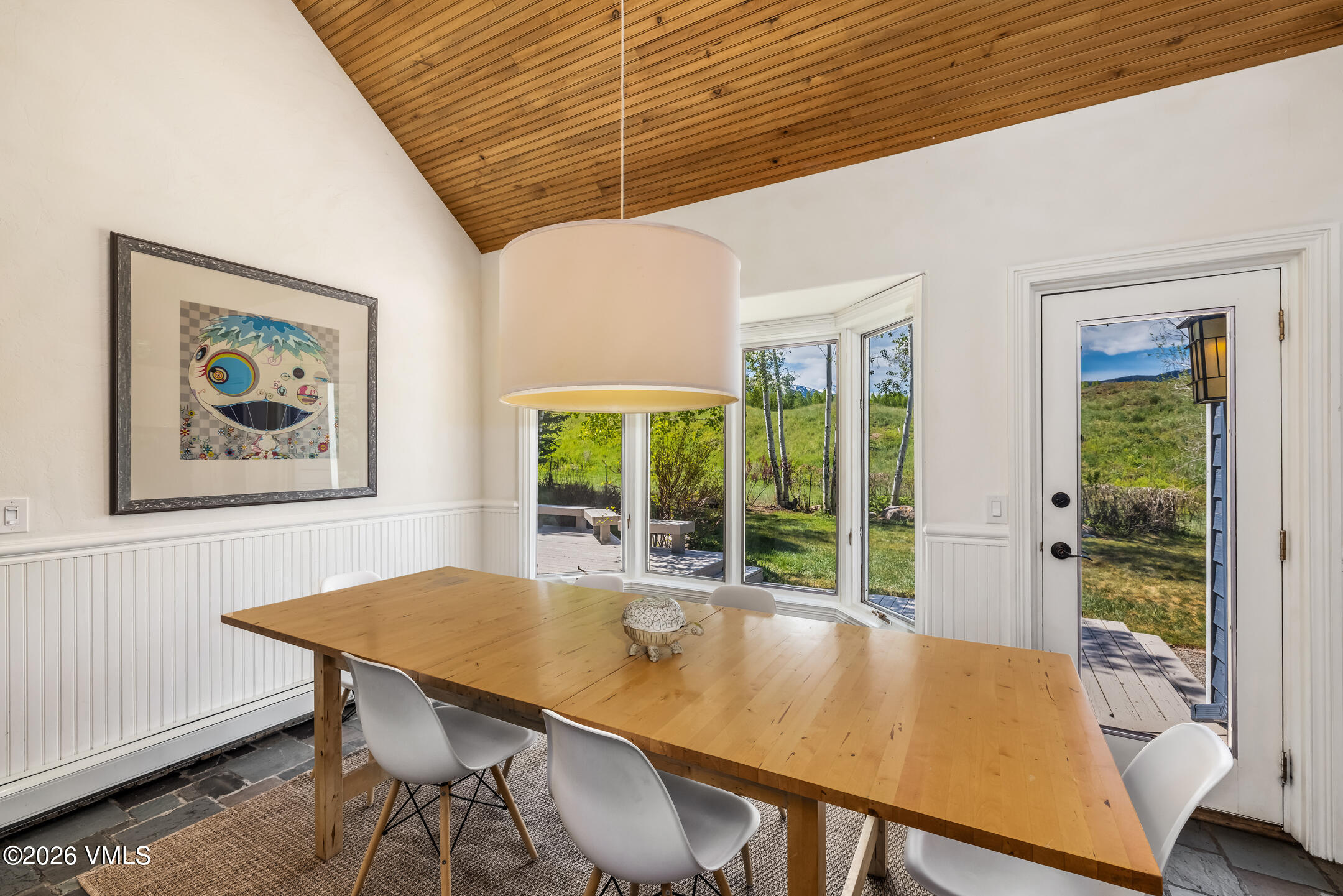 321 Meile Lane Edwards, CO 81632 - Photo 11 of 44 a view of a dining room with furniture window and outside view