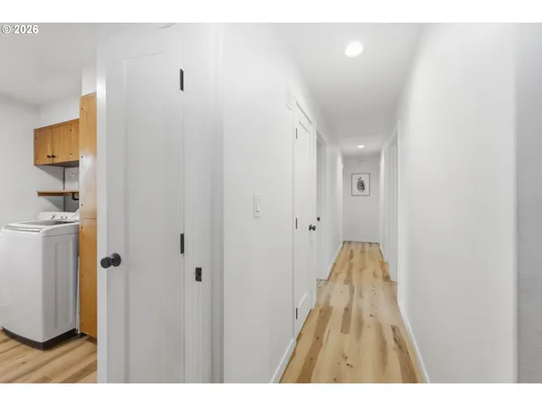 a view of a bedroom from the hallway