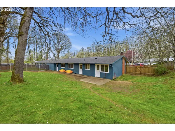 a view of house with a garden