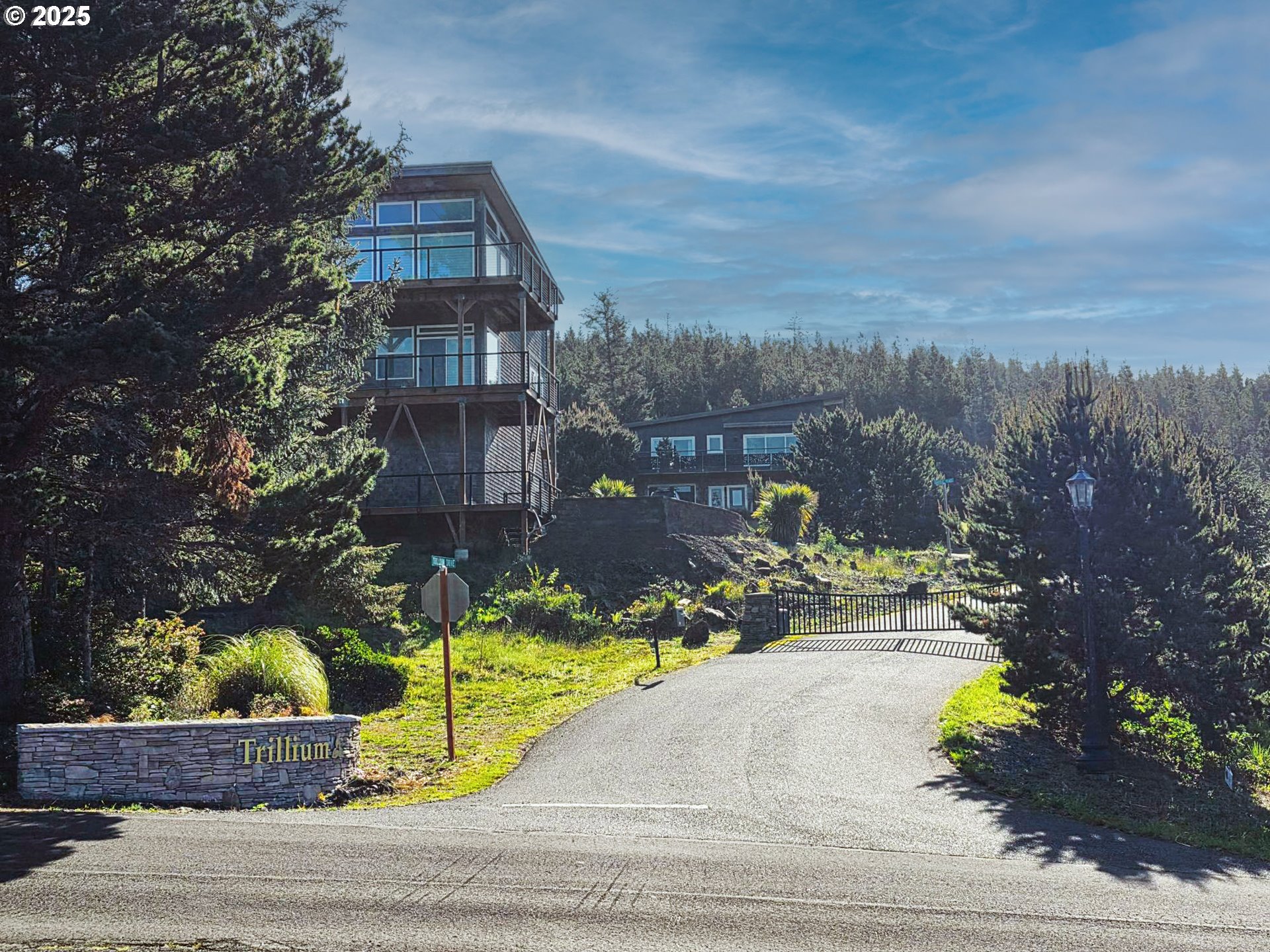 Castle Place, Unit TL 103 Tillamook, OR 97141 - Photo 11 of 11 a view of a brick house with a yard