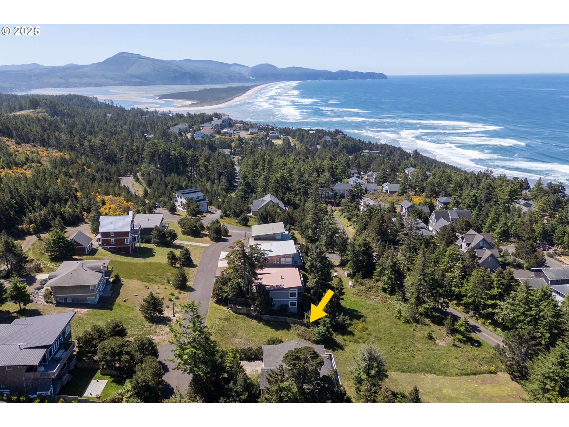 Castle Place, Unit TL 103 Tillamook, OR 97141 - Photo 5 of 11 a view of a city with mountains in the background