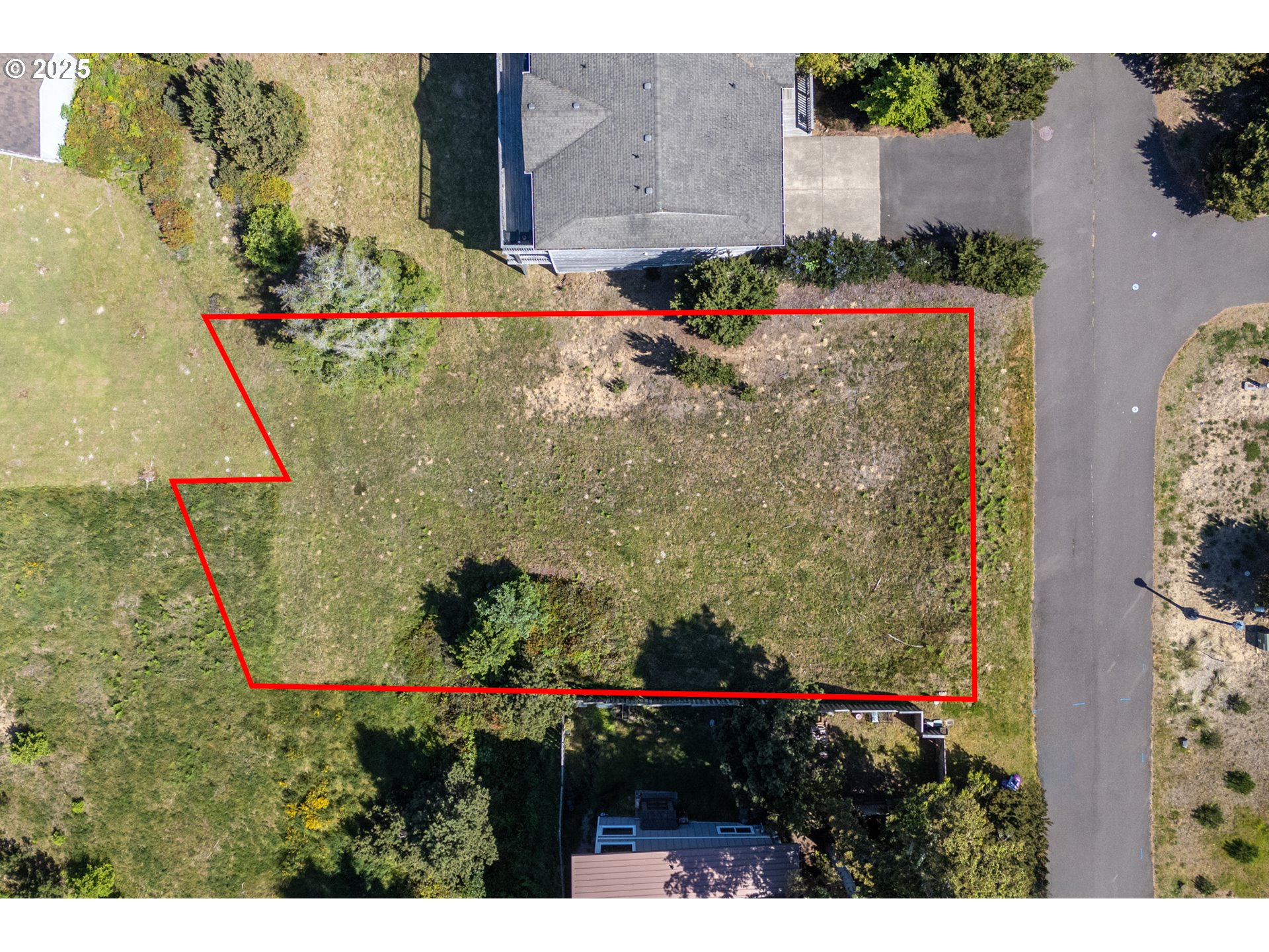 Castle Place, Unit TL 103 Tillamook, OR 97141 - Photo 6 of 11 a view of a yard