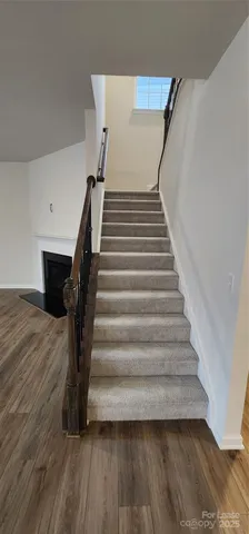 a stove top oven sitting inside of a kitchen