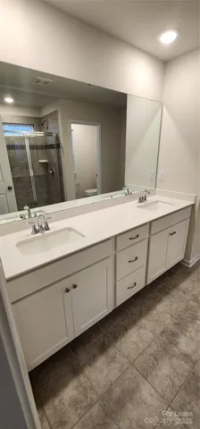 a bathroom with a toilet and a sink