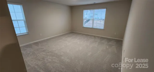 a view of a patio with a yard