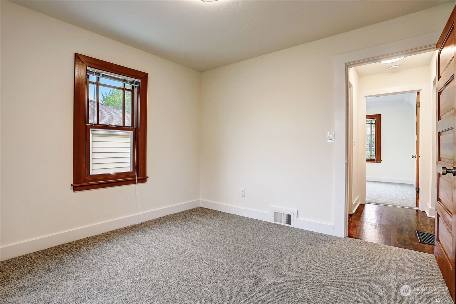 8421 16th Avenue Southwest Seattle, WA 98106 - Photo 10 of 16 an empty room with windows and closet
