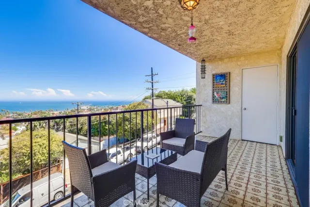 a kitchen with a table and chairs in it