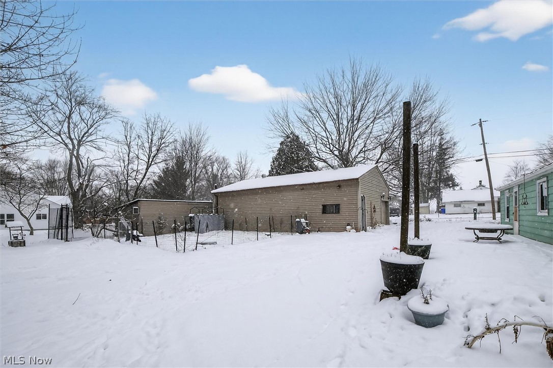 3309 Winchell Road Mantua, OH 44255 - Photo 20 of 22 Snow covered property with an outdoor structure