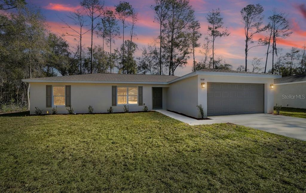 8992 North Lisa Terrace Citrus Springs, FL 34433 - Photo 1 of 25 a view of outdoor space and yard